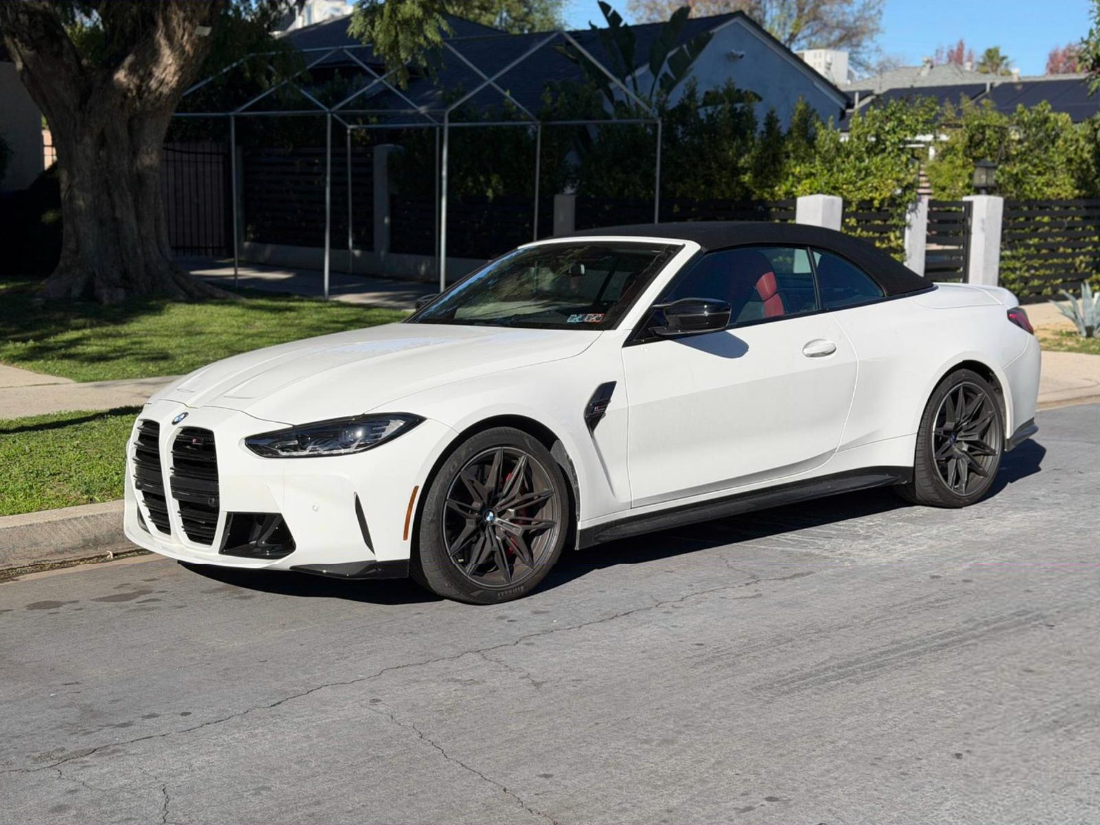 White BMW M4 convertible after work at GV